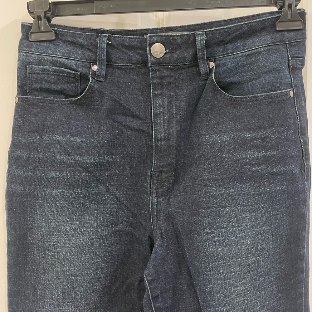 Dark distressed Harper jeans.